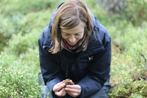 Image of Dr Helen Taylor, from the RZSS Conservation Programme, preparing to release a larva into the wild. Photo by RZSS.